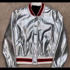 Vintage looking silver bomber jacket.